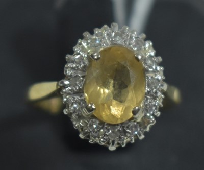Lot 94 - Citreen and diamond cluster ring