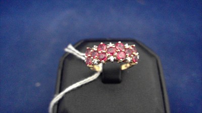 Lot 470 - Ruby and diamond dress ring