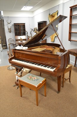 Lot 878 - Daneman piano and stool.