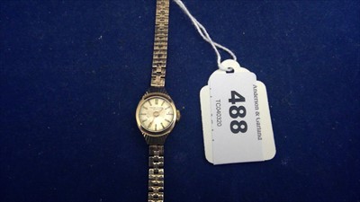 Lot 488 - Gold cocktail watch