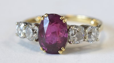 Lot 129 - Ruby and diamond ring