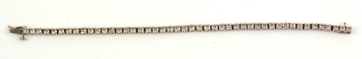 Lot 58 - Diamond tennis bracelet