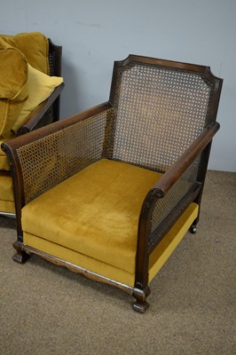 Lot 62 - Early/mid 20th C walnut Bergere three-piece suite.