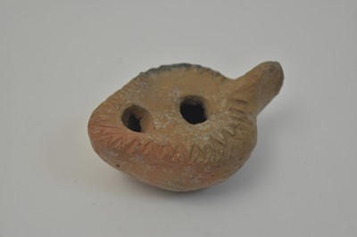 Lot 702 - Ancient Roman oil lamp and coins