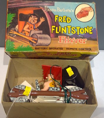 Lot 1204 - Marx (Hong Kong) Tinplate Fred Flintstone Flivver remote control Stone-age car.