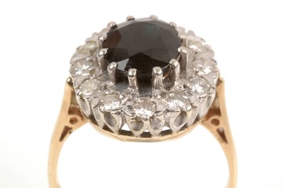 Lot 115 - Sapphire and diamond ring