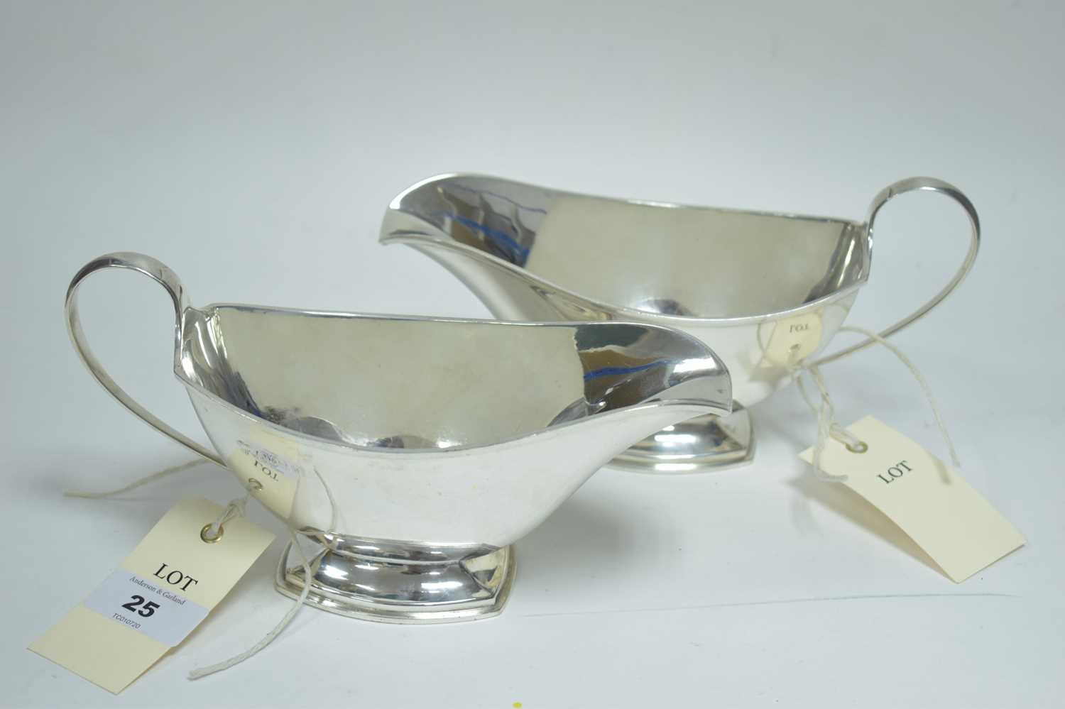 Lot 25 - A pair of silver sauce boats