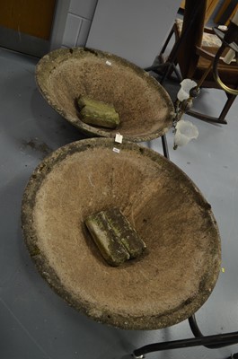 Lot 609 - A pair of composite stone urns