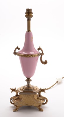Lot 968 - A pair of Sevres style gilt metal table lamps.
