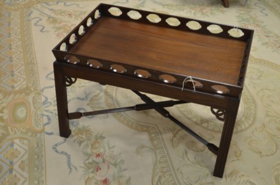Lot 556 - A Chippendale style coffee table