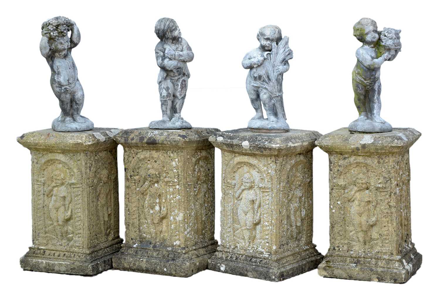 Lot 1188 - Four garden ornaments representing the four seasons