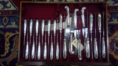 Lot 259 - Oak canteen of silver cutlery