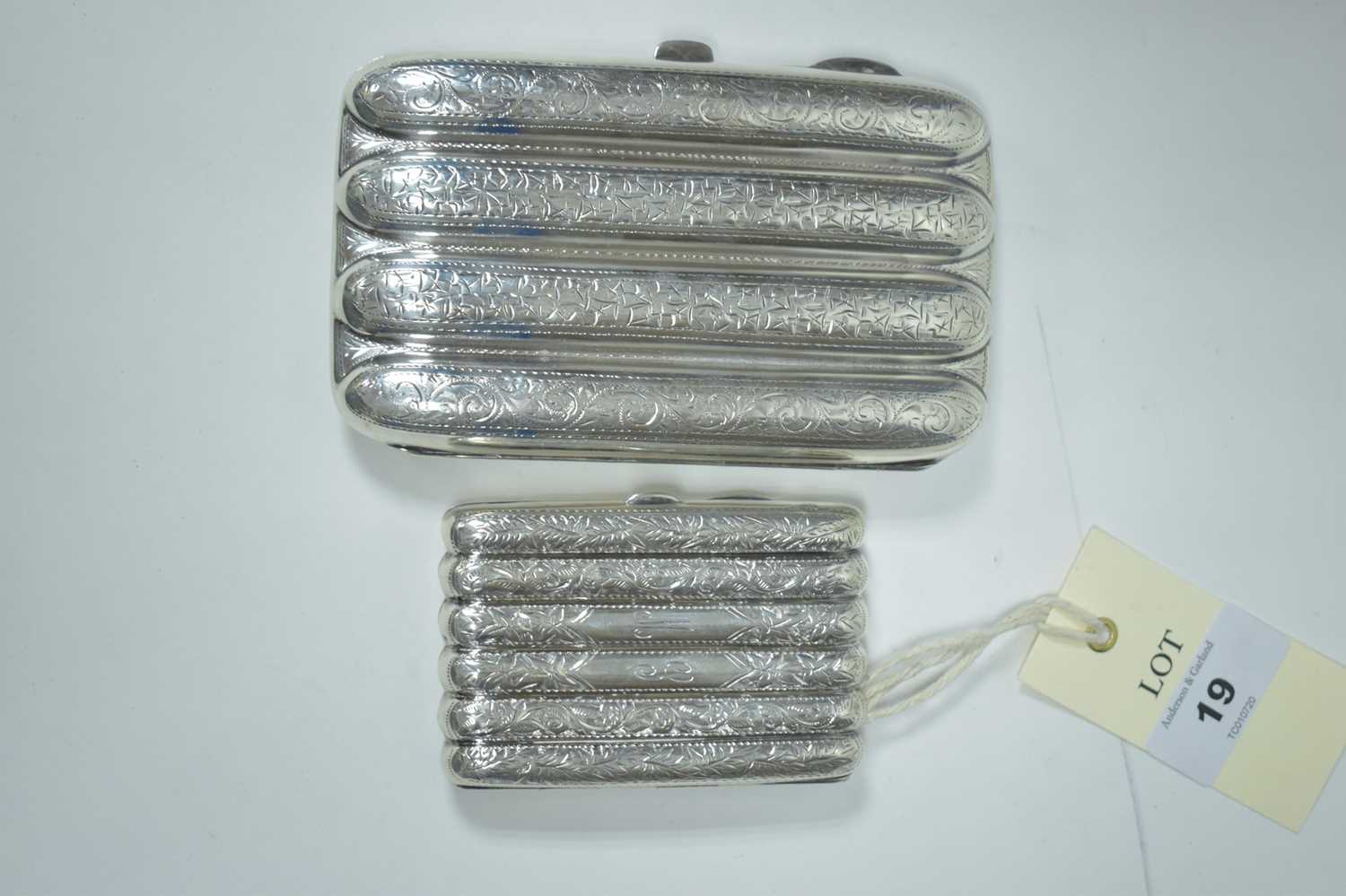 Lot 19 - Two silver cigar cases