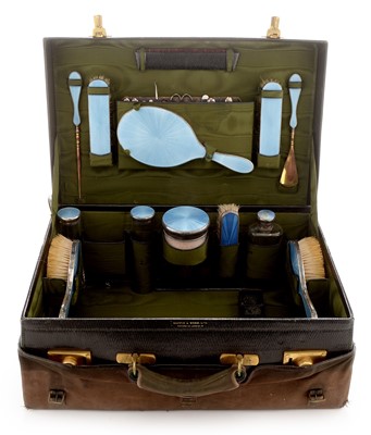 Lot 230 - Green leather travel case with silver and enamel fittings