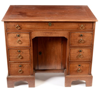 Lot 870 - 19th Century padauk kneehole desk