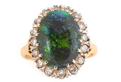 Lot 156 - Black opal and diamond cluster ring