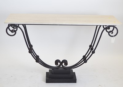 Lot 416 - Polished limestone and wrought iron console table