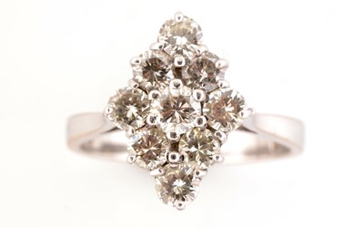 Lot 160 - A nine stone diamond ring