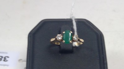 Lot 382 - Emerald and diamond ring
