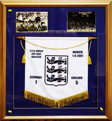 Lot 622 - A framed montage: F.I.F.A. World cup Qualifier. Germany v England.