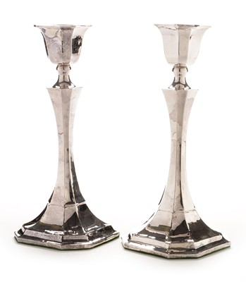 Lot 207 - A pair of silver candlesticks
