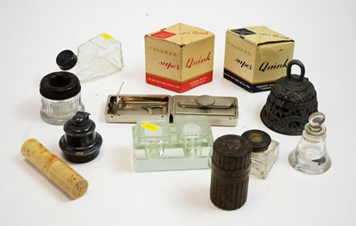 Lot 700 - A small collection of ink bottles/pen related collectables.