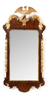 Lot 724 - A reproduction George II style mahogany and giltwood wall mirror