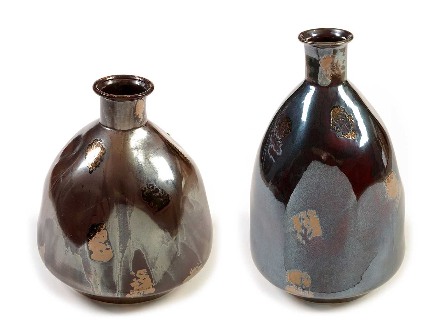Lot 1104 - Two continental conical luster vases