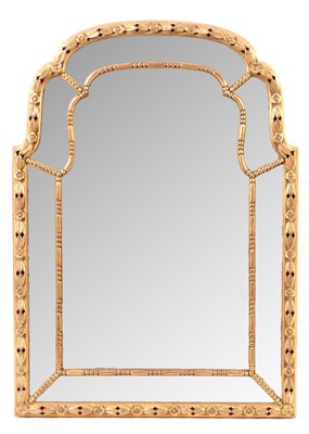 Lot 679 - A modern giltwood seven plate mirror