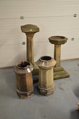 Lot 482 - Composite stone bridbath, plinth and chimney pots.