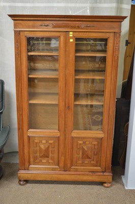 Lot 948 - Continental walnut bookcase
