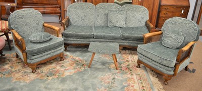Lot 809 - A walnut framed bergere three-piece suite, c 1940's; and stool