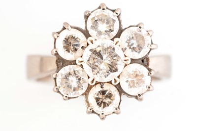 Lot 175 - Seven stone diamond cluster ring