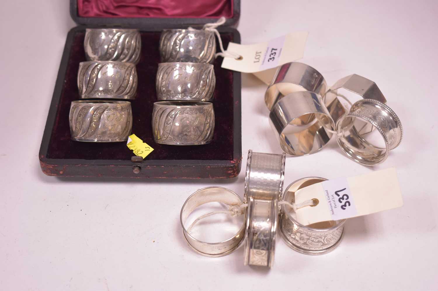 Lot 337 - Silver and white metal napkin rings