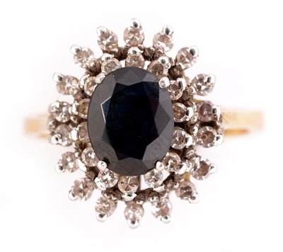 Lot 177 - Sapphire and diamond cluster ring