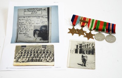 Lot 723 - Five WWII medals; and two WWII period photographs.