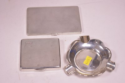 Lot 449 - Two silver cigarette cases and an ash tray