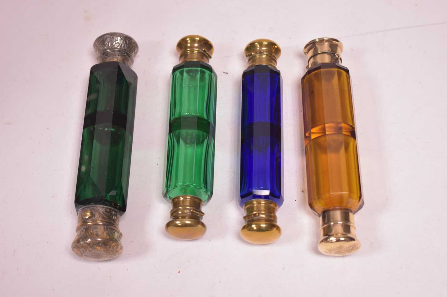 Lot 498 - Four double ended scent bottles