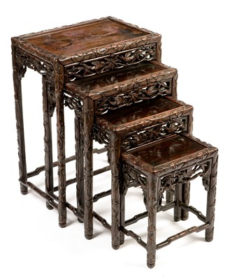 Lot 822 - Nest of four late 19th / early 20th Century Chinese tables