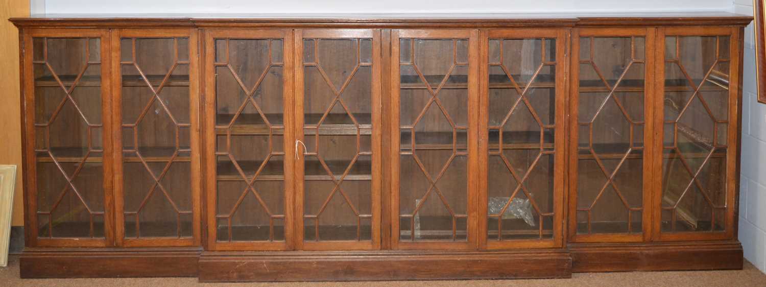 Lot 546 - 20th Century oak breakfront bookcase
