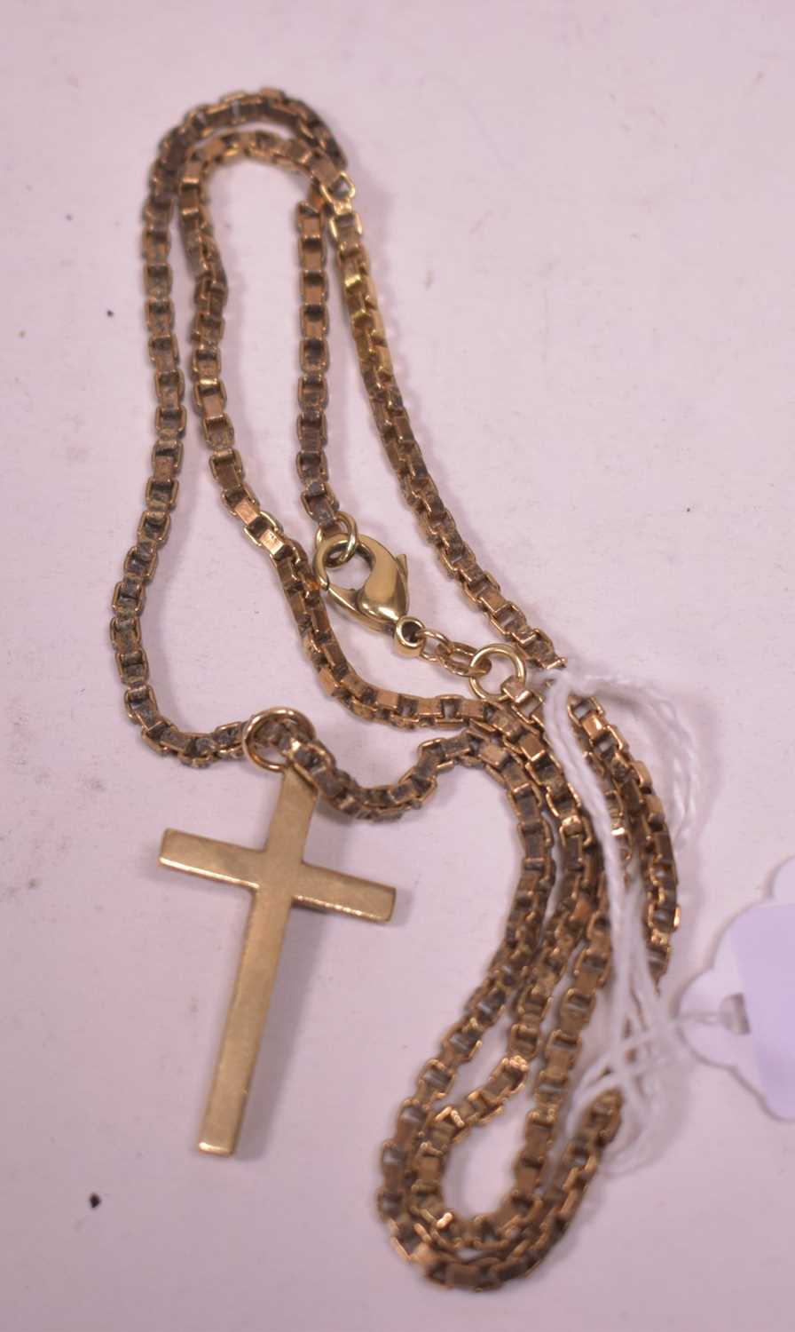 Lot 21 - Gold crucifix pendant and chain