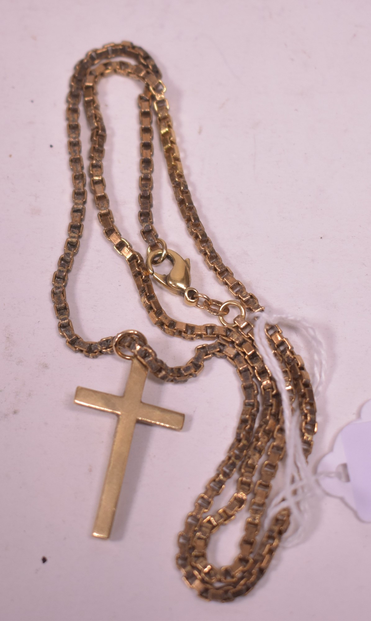 Lot 21 Gold crucifix pendant and chain