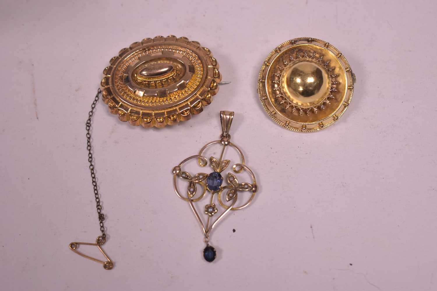 Lot 373 - Two Victorian brooches and an Edwardian pendant