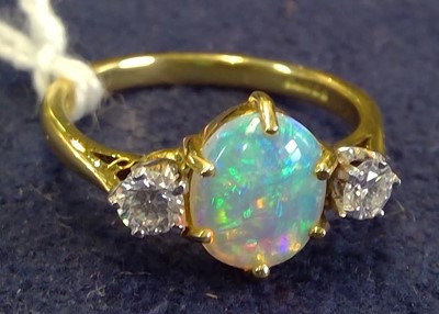 Lot 46 - Opal and diamond ring