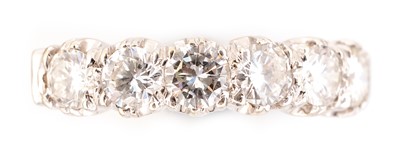 Lot 68 - Diamond half band diamond ring
