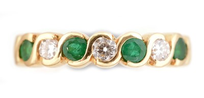 Lot 72 - Emerald and diamond ring