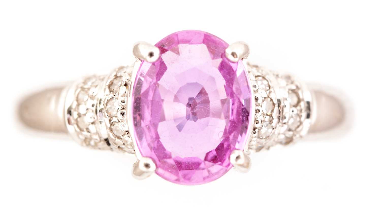 Lot 74 - Pink sapphire and diamond ring