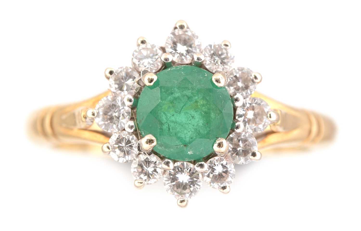 Lot 77 - Emerald and diamond cluster ring