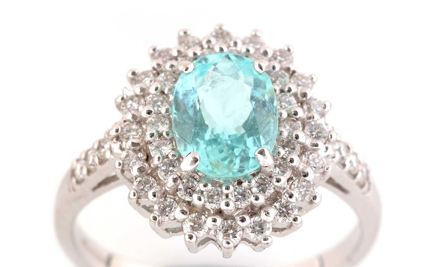 Lot 81 - Apatite and diamond cluster ring