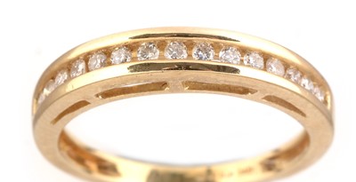 Lot 104 - A diamond half hoop eternity ring